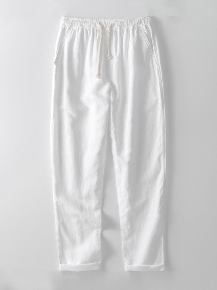 Style relax et raffiné : ensemble homme été chemise manches courtes col montant et pantalon en lin.