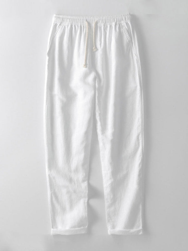 Style relax et raffiné : ensemble homme été chemise manches courtes col montant et pantalon en lin.