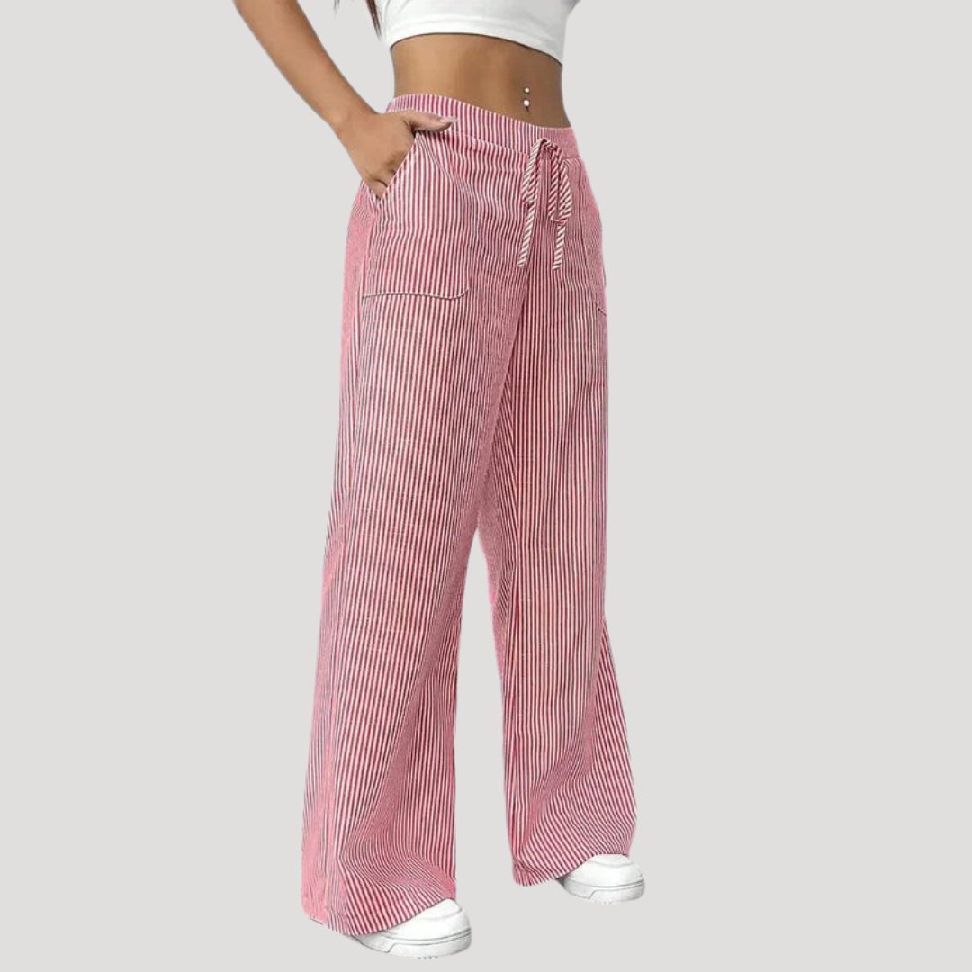 Pantalon femme fluide et décontracté à jambes larges rayées, parfait pour un style confortable et chic au quotidien.