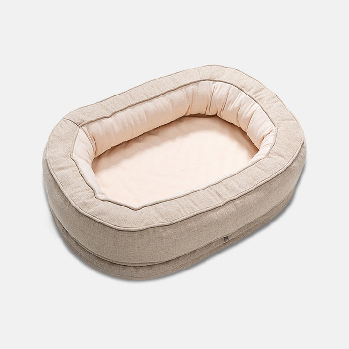 Lit chien luxe avec soutien orthopédique, conçu pour un sommeil réparateur et un confort optimal pour votre compagnon.