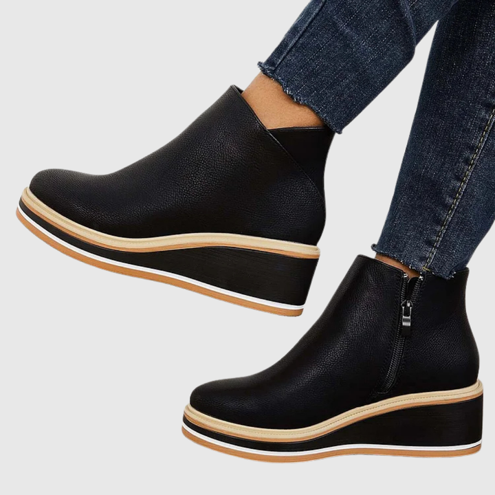 Bottes d'hiver femme noires, élégantes, chaudes et confortables. Affrontez le froid avec style et aisance.