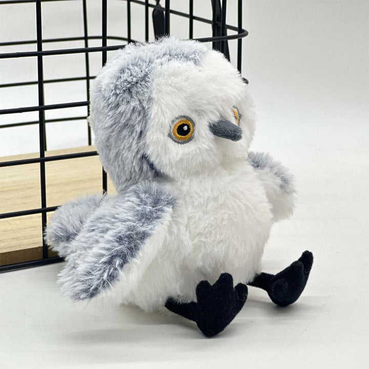 Jouet félin innovant : plumes naturelles et sons réalistes pour une expérience de chasse captivante.
