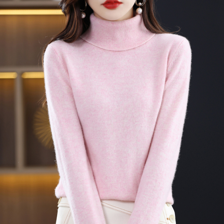 Pull col roulé femme, pièce de mode féminine élégante et douillette pour un hiver stylé et cosy.