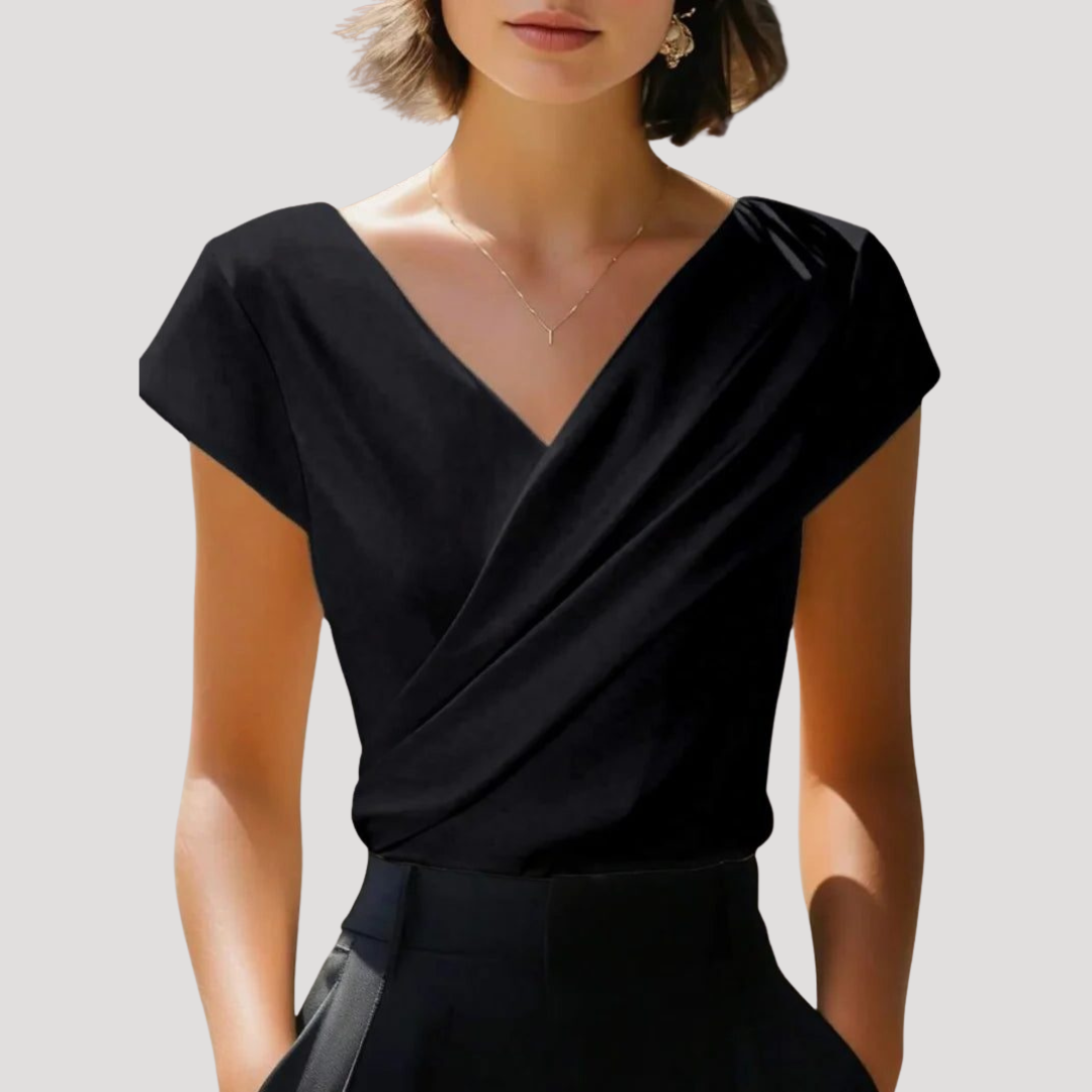 Blouse cache-cœur femme élégante, col V, manches courtes, idéale pour un look chic au quotidien.
