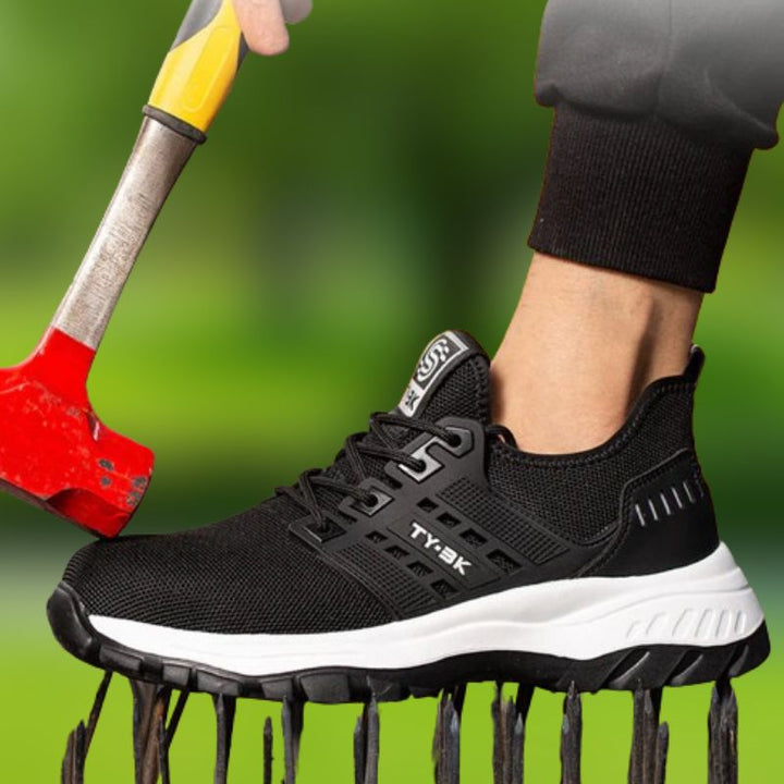 Chaussures de sécurité noires pour hommes, protection renforcée et semelle antidérapante pour le travail.