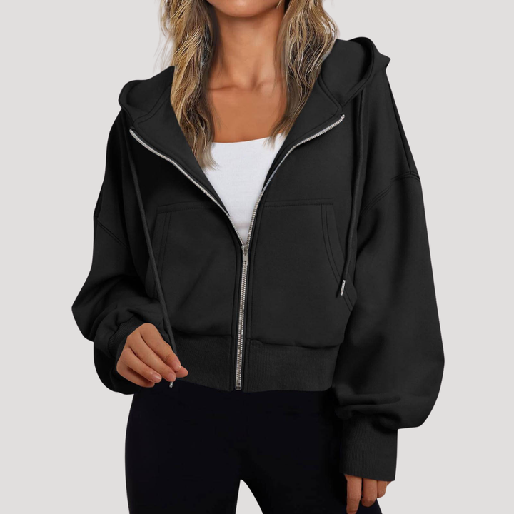 Veste à capuche femme décontractée avec manches ballon modernes. Idéale pour le printemps et l'automne.