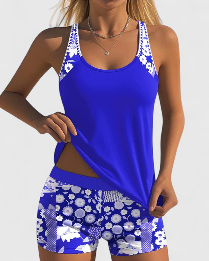 Tankini femme sportif deux pièces: Top uni, short floral. Idéal plage, piscine et activités estivales.