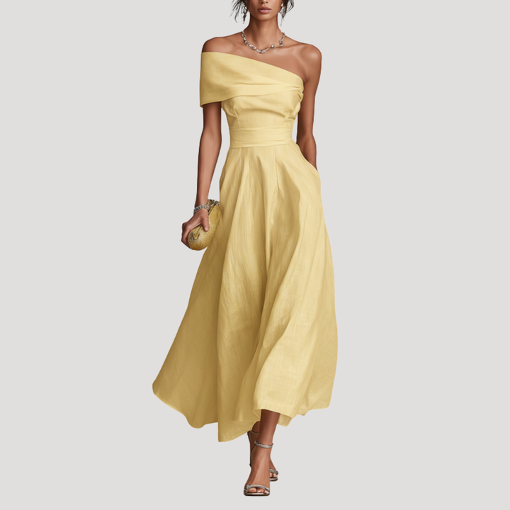 Robe cocktail femme jaune longue, asymétrique et cintrée, idéale pour soirée élégante ou cérémonie.