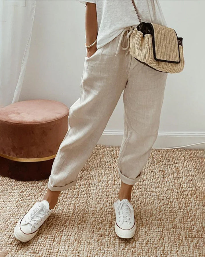 Pantalon lin femme chic et casual, taille ajustable. Idéal mode quotidienne, confort printemps/été.