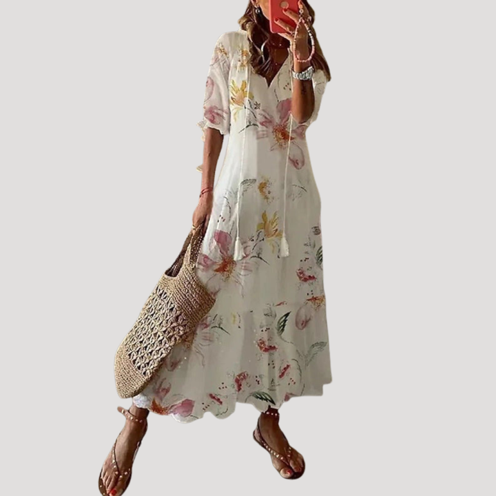 Robe longue fluide bohème pour femme, idéale pour l'été, allie confort et style décontracté chic.