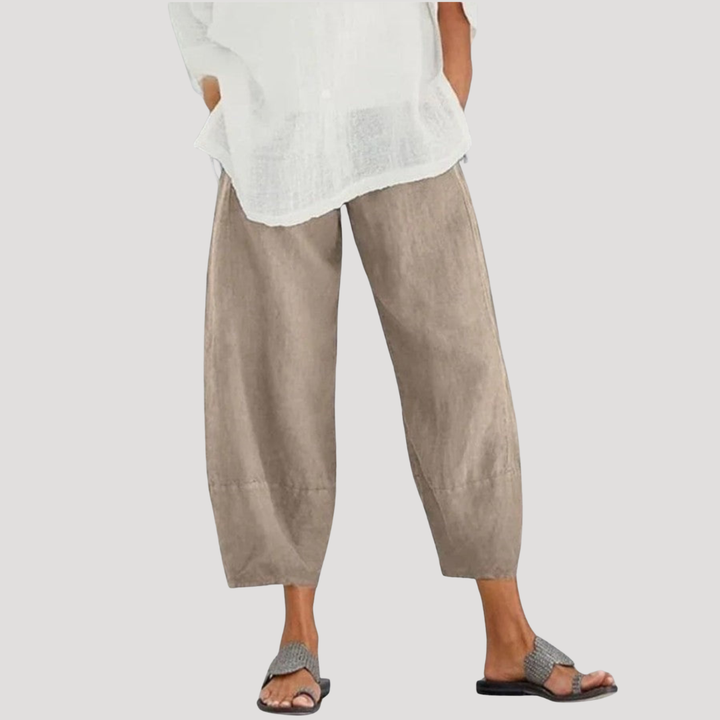 Pantalon ample femme en lin, taille élastique, parfait pour un confort décontracté d'été. Mode femme fluide.