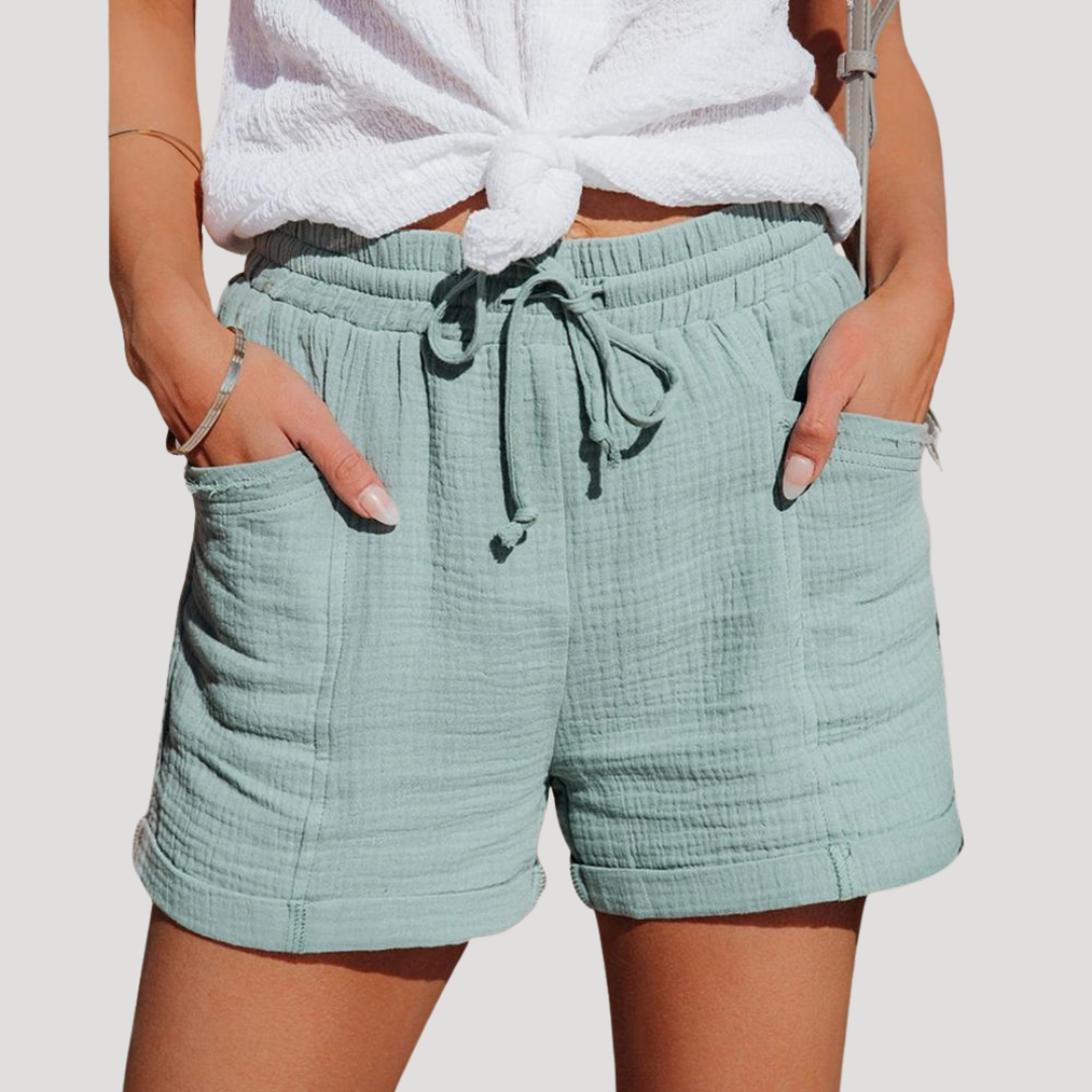 Short fluide femme confortable, taille élastique avec cordon. Parfait pour l'été, une tenue estivale décontractée.