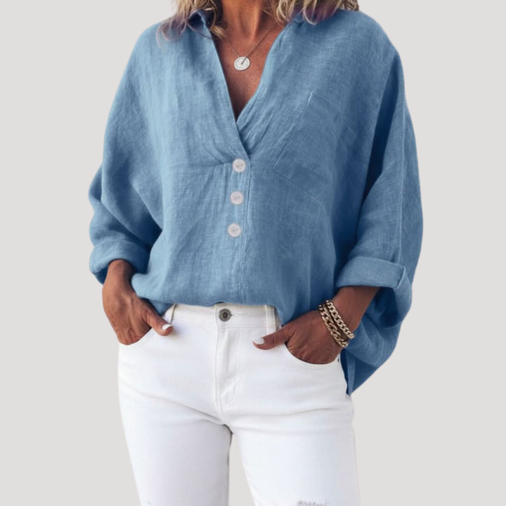 Blouse fluide femme, col V et patte de boutonnage, style élégant et confortable.
