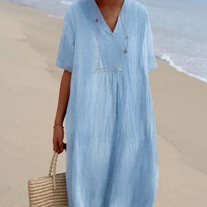 Robe d'été fluide femme, confortable et légère, parfaite pour la plage ou les vacances.