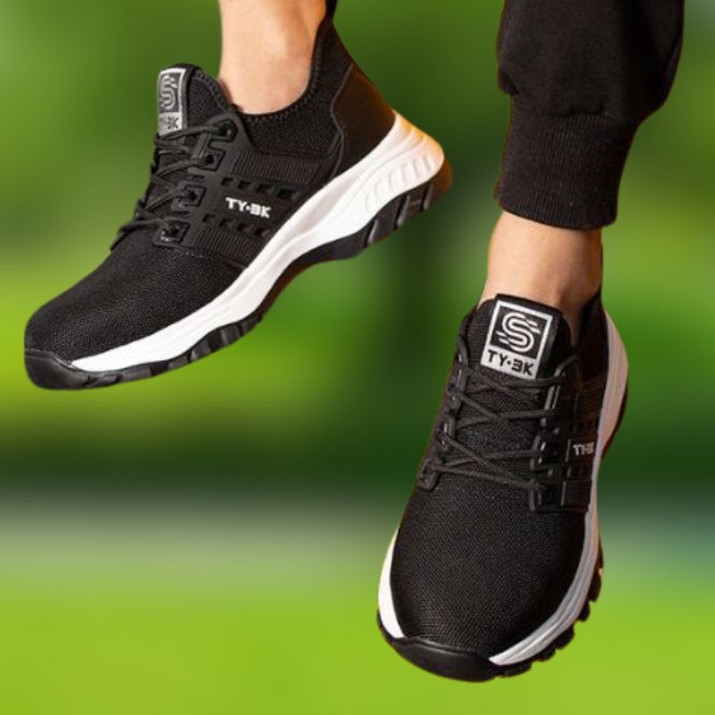 Vue rapprochée des chaussures de travail ergonomiques pour hommes, semelle orthopédique pour un confort optimal.
