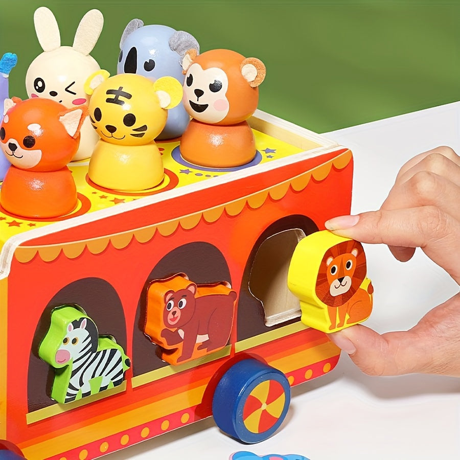Camion jouet éducatif cirque avec figurines animaux, idéal pour le jeu créatif et la découverte des enfants.