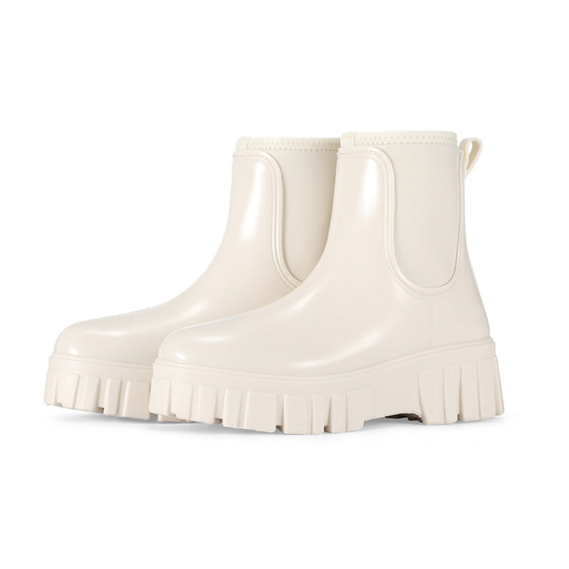 Bottes de pluie imperméables en caoutchouc pour femmes, style cheville, parfaites pour l'automne et l'hiver.