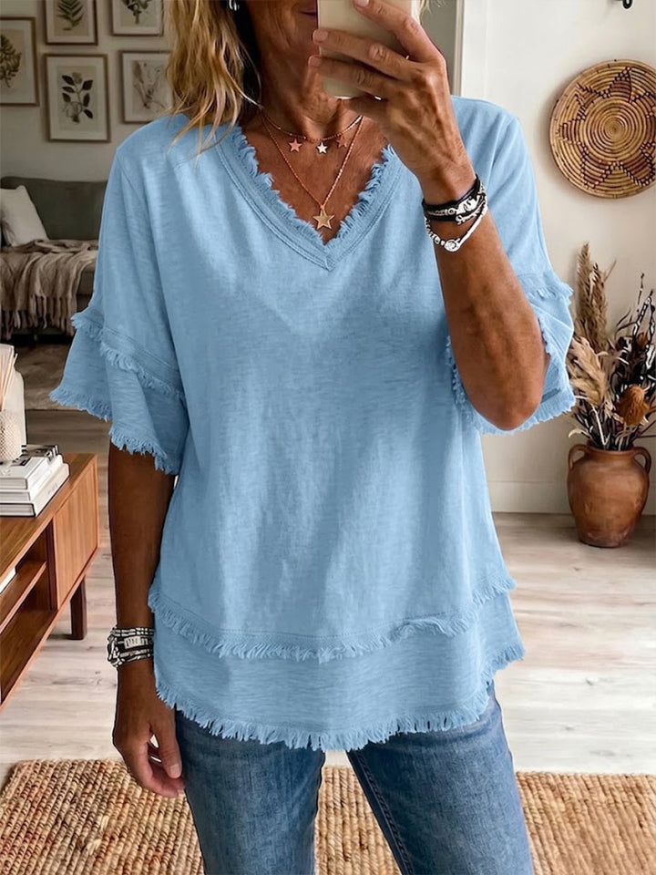 Haut femme en lin blanc, col V élégant, manches courtes, idéal été décontracté chic.