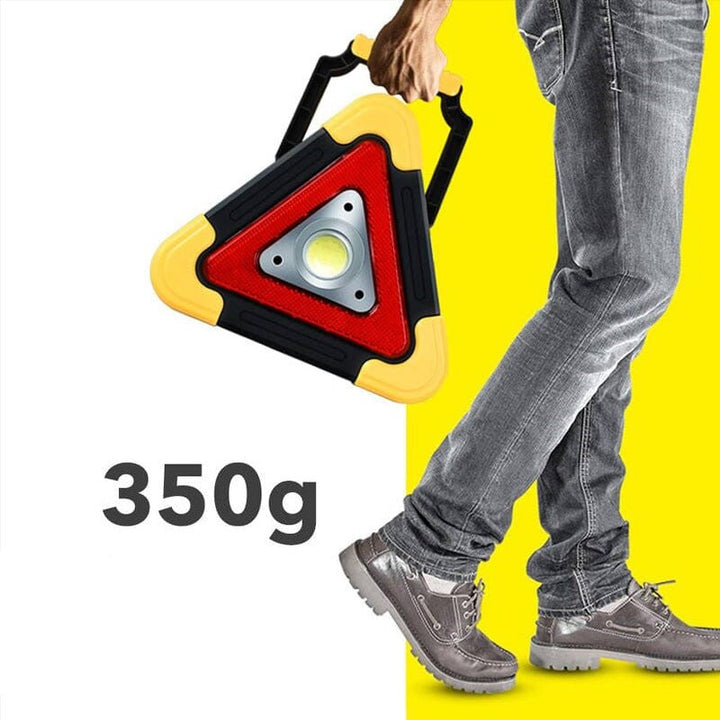 Dispositif sécurité routière: lumière triangulaire LED avec support stable pour avertir les usagers.