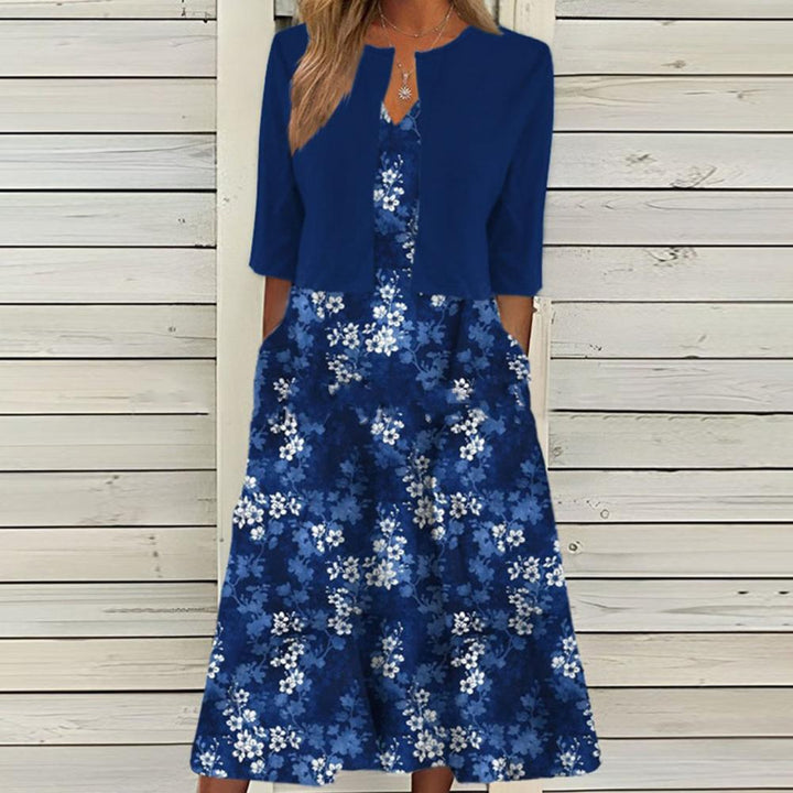 Vue dos de la robe midi fleurie élégante, coupe fluide et confortable pour femme, mode estivale et printanière chic.