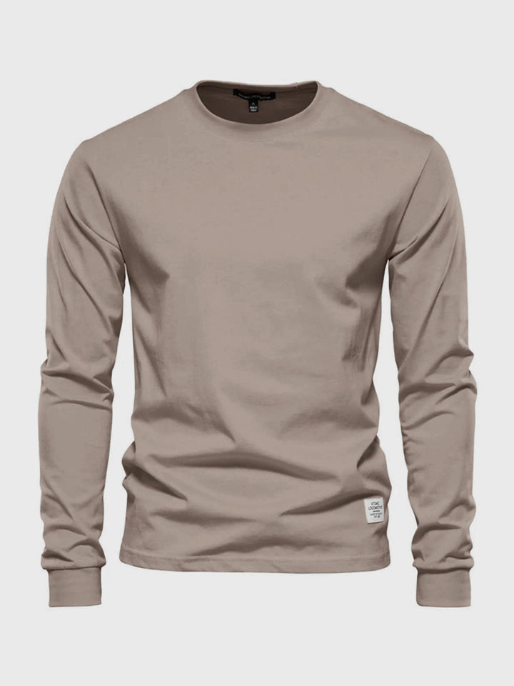 T-shirt homme manches longues, col rond, coupe droite, confortable pour look décontracté et polyvalent.