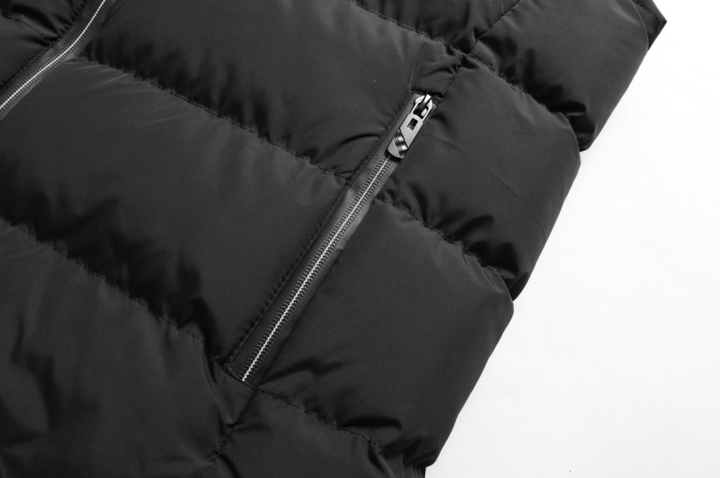 Veste chauffante VitalWarm unisexe, assure chaleur et protection contre le froid pendant la saison hivernale.