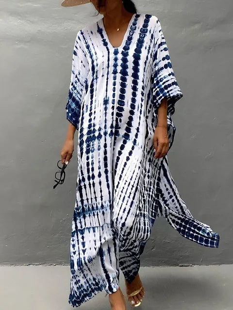 Caftan longue femme, style bohème fluide, élégance décontractée pour un été stylé.
