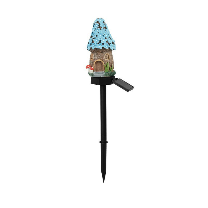 Lampe solaire champignon illuminée la nuit, crée une ambiance féerique dans le jardin avec sa lumière LED.