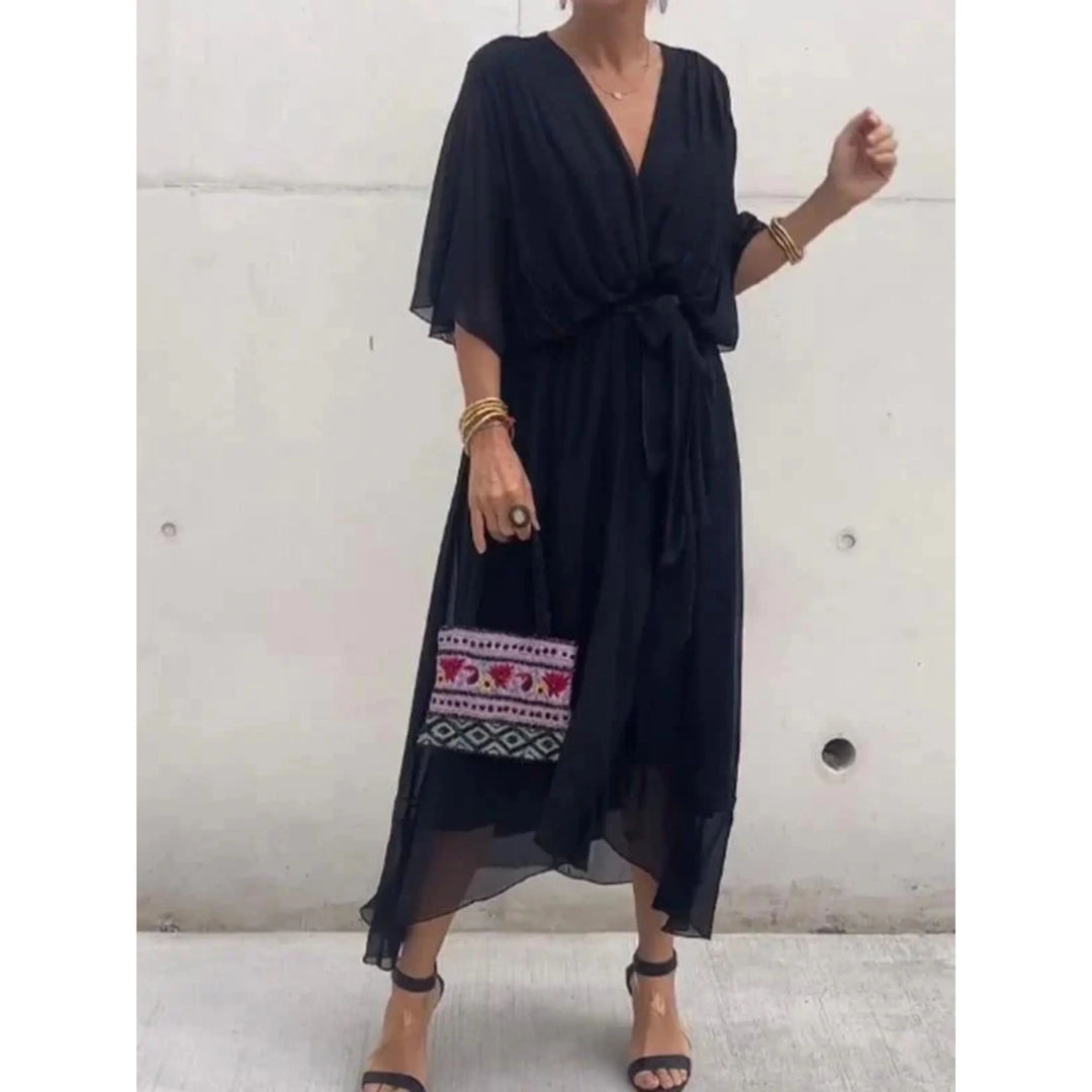 Robe fluide femme col V, style chic et décontracté, idéale pour diverses occasions.