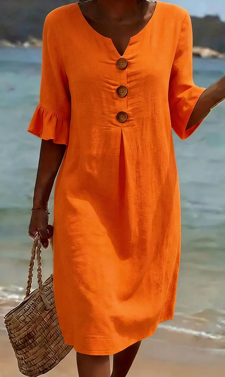 Robe boutonnée femme en coton lin, coupe décontractée. Manches volantées, idéale pour les chaudes journées d'été.