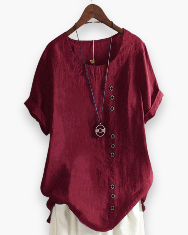 Blouse femme à manches courtes, boutonnée, légère. Pour un look chic décontracté estival.