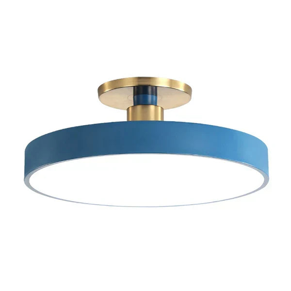 Éclairage LED rond moderne, plafonnier nordique créant une ambiance lumineuse parfaite pour salon et chambre.