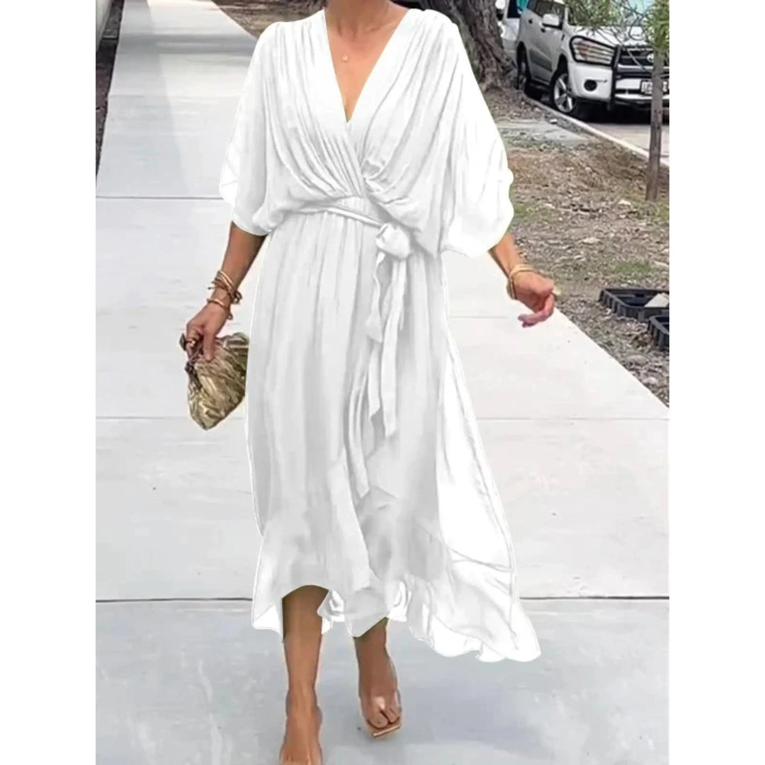 Robe fluide élégante col V pour femme, parfaite pour l'été ou le printemps.
