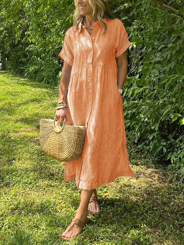 Robe longue boutonnée à manches courtes pour femme, style estival élégant, tissu fluide et confortable.