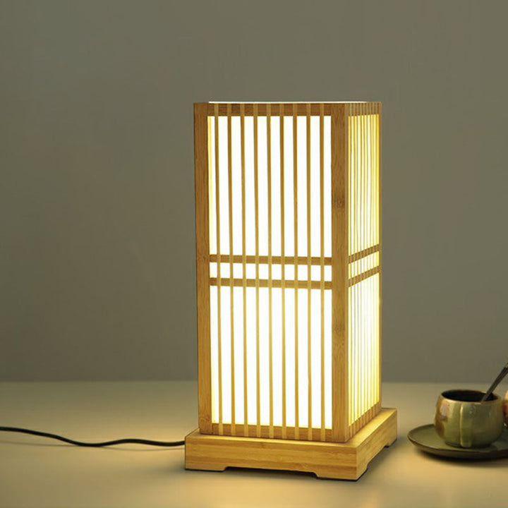 Lampe de chevet apaisante, design naturel et moderne pour une chambre relaxante.
