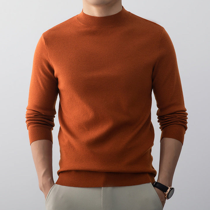 Pull classique homme à manches longues. Confortable et élégant, essentiel pour toute garde-robe.