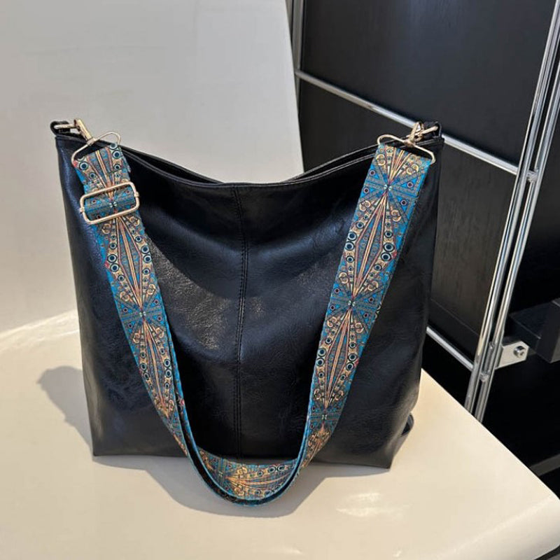 Sac bandoulière Wanda gris, cuir PU, élégant et pratique pour la femme urbaine.