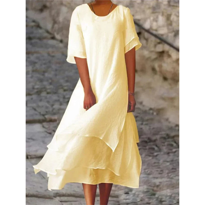 Robe de journée intemporelle pour femme, coupe fluide et confortable, parfaite pour une mode féminine élégante.