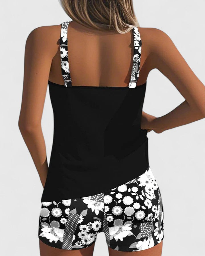 Tankini femme élégant et sportif: Top uni, short floral. Idéal pour vos vacances à la plage ou piscine.