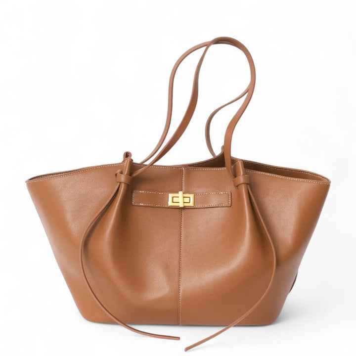 Sac à main grand format élégant, conçu pour les femmes actives, un accessoire chic et pratique.