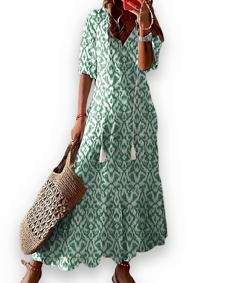 Robe longue imprimée fluide femme, col V, idéale pour un look décontracté chic d'été. Confortable.