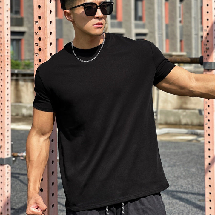 T-shirt de sport ample pour hommes, manches courtes, respirant et confortable pour tout sport.