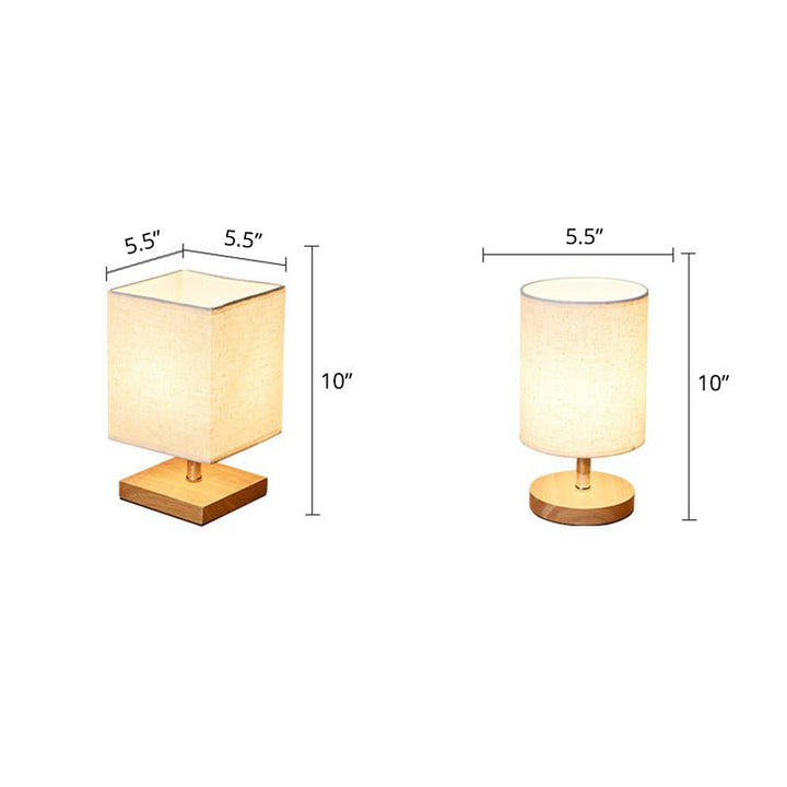 Luminaire de table en bois et abat-jour lin, offrant une lumière douce et chaleureuse pour bureau.
