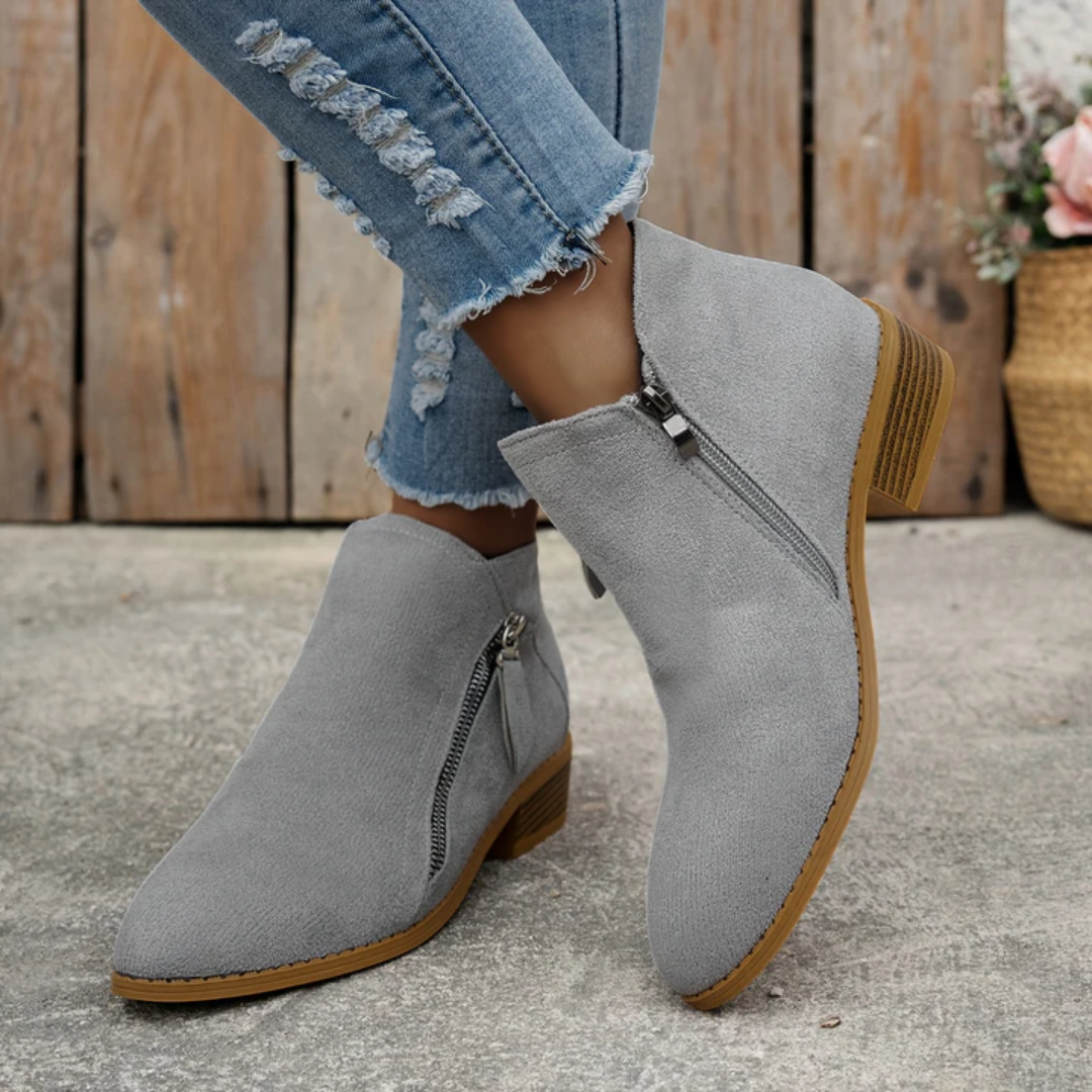 Bottines confortables avec fermeture éclair pour femmes, design chic et soutien orthopédique.