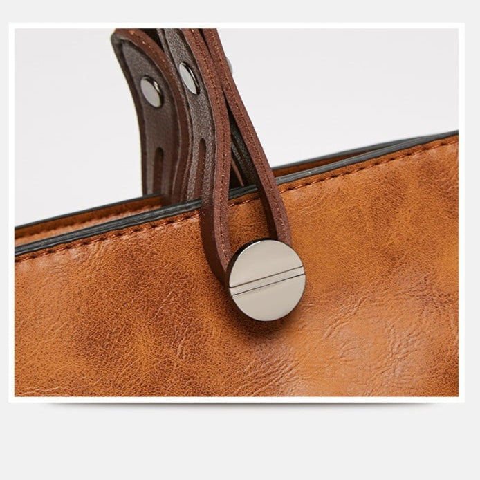 Sac femme en cuir PU marron, élégant et résistant, avec bandoulière réglable pour plus de confort.