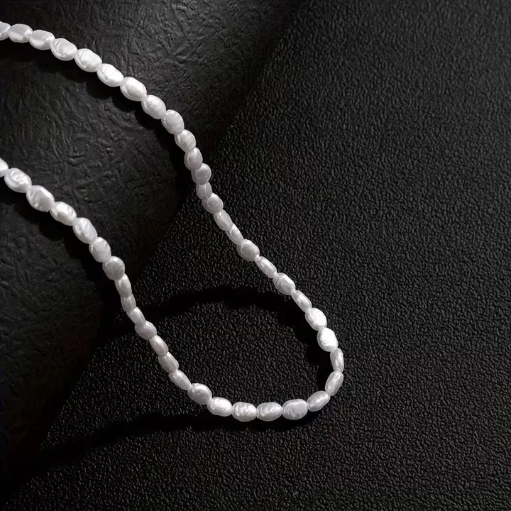Collier pour homme en perles baroques ivoire nacré de qualité et nacre authentique. Bijou élégant et raffiné.