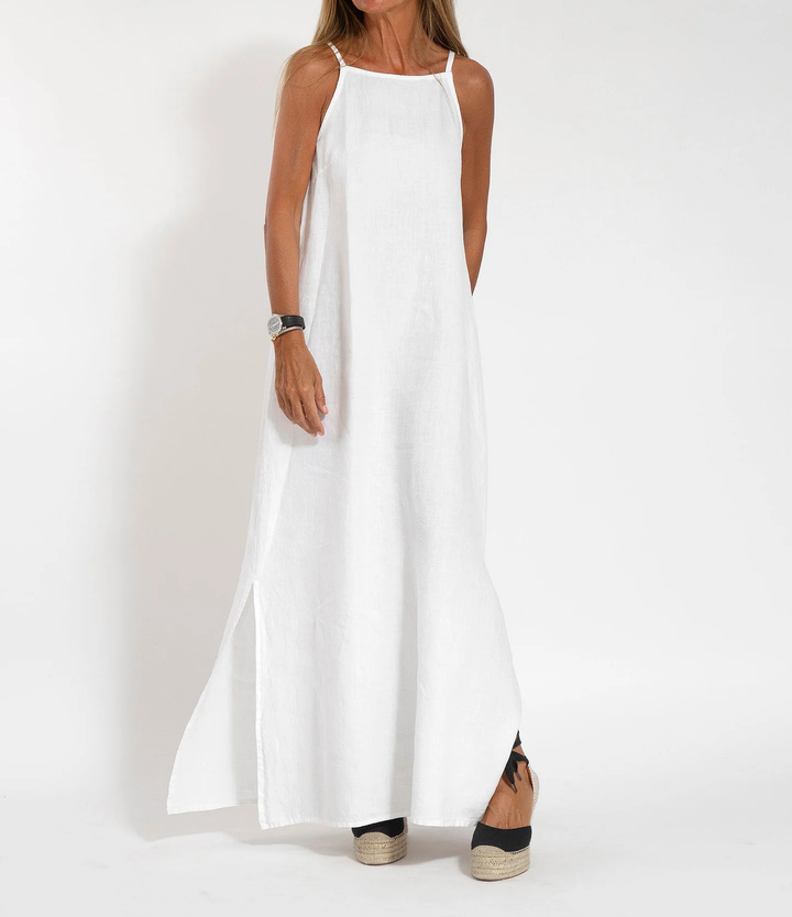 Robe longue fluide femme à bretelles fines, parfaite pour l'élégance estivale et les vacances chic en été.