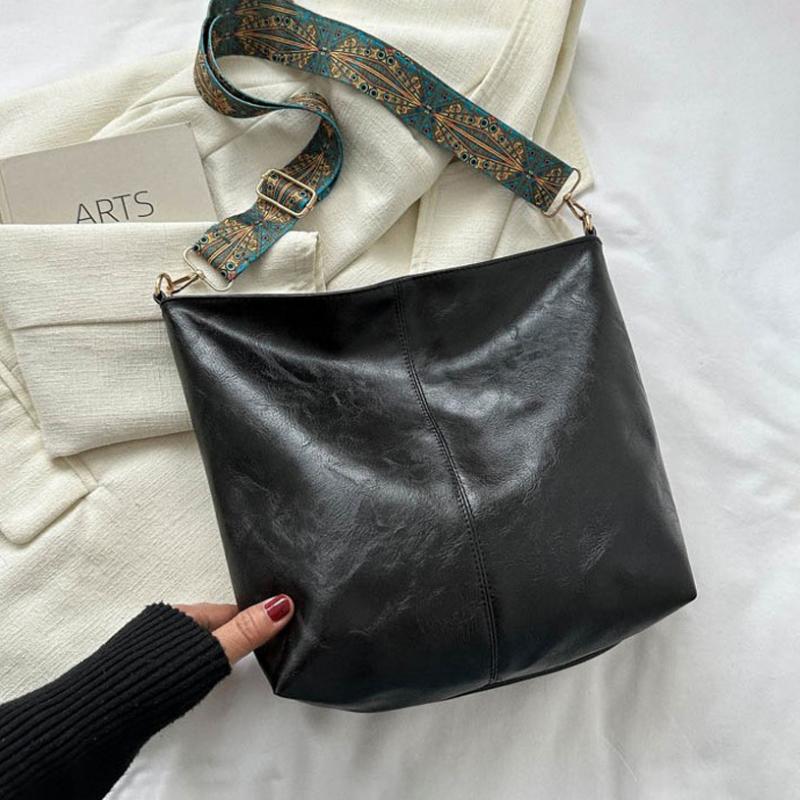 Sac bandoulière femme Wanda en cuir PU, pour un style élégant et décontracté.