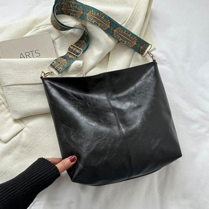 Sac bandoulière femme Wanda en cuir PU, pour un style élégant et décontracté.