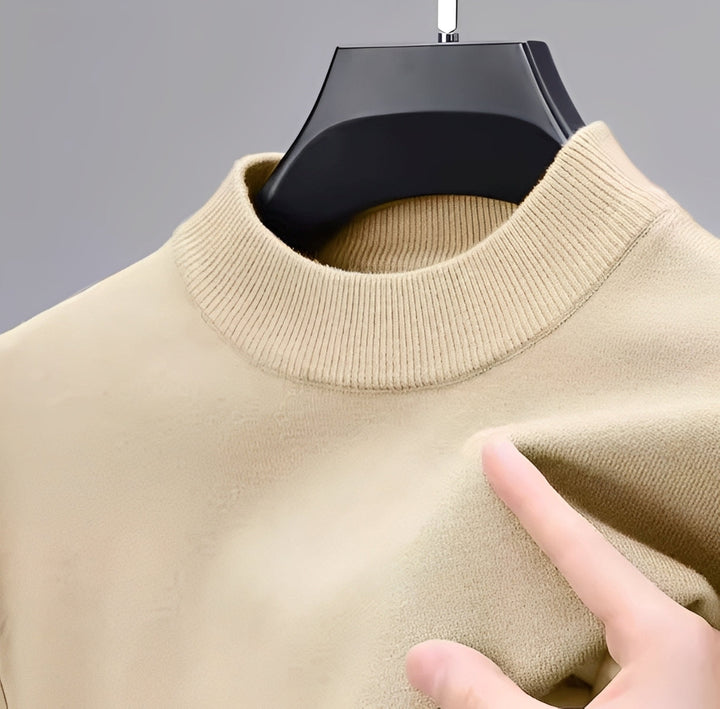 Pull homme gris moderne et confortable, idéal pour l'hiver et l'automne. Vêtement masculin polyvalent.